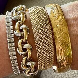 18k white and yellow gold oval link bracelet with toggle clasp